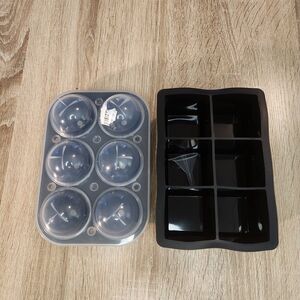 set of silicone ice cube trays, o large square cubes and one for sphere-shape
